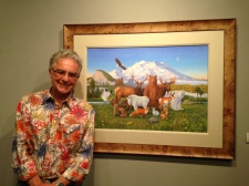 Monte Dolack with the original artwork, "The Peaceable Kingdom of Wilderness." 